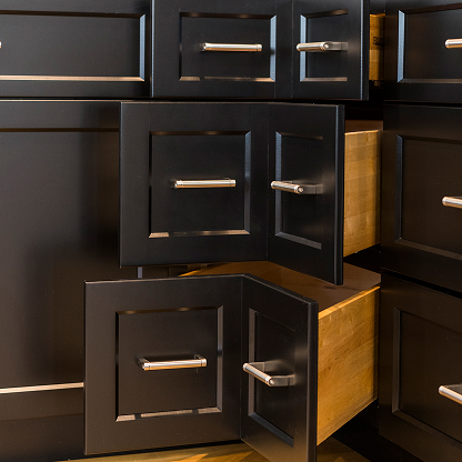 Black kitchen cabinet corner drawers with brushed nickel hardware