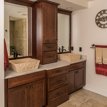 Spa-like master bathroom with dark wood cabinetry and rectangular vessel sinks