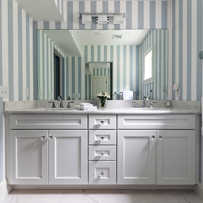 Master bathroom vanity with striped wallpaper, marble countertop and white shaker cabinets - custom bathroom design