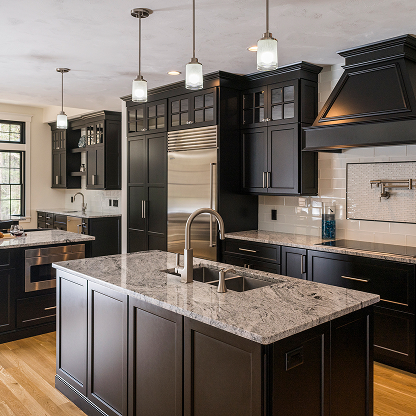 Luxury dark kitchen with black cabinets, granite countertops and pendant lighting - modern kitchen design