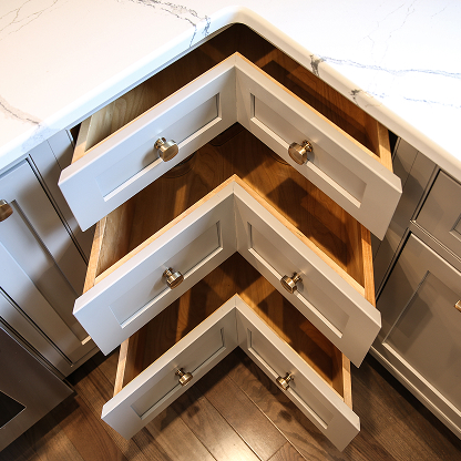 Custom corner drawer storage solution with soft-close hardware - innovative kitchen organization
