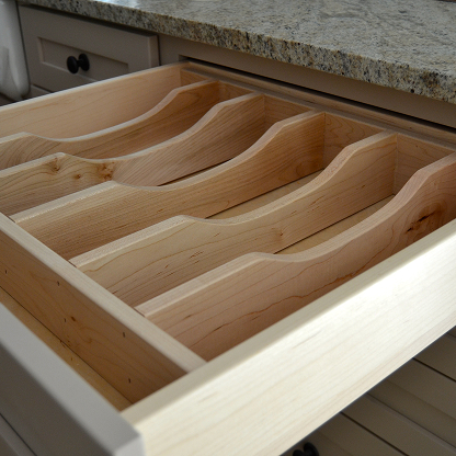 Custom wooden drawer organizer insert with diagonal compartments for flatware